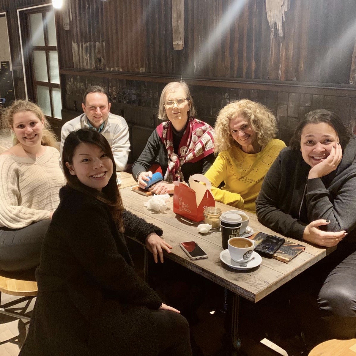 Group of people sitting around table